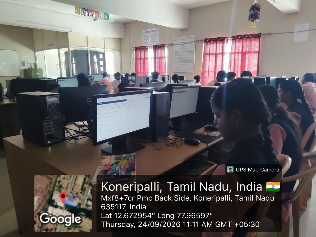 A student working at a computer in a laboratory during the Code Tandra technical training.