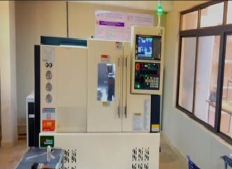 A CNC machine with its control panel, in the centre of excellence